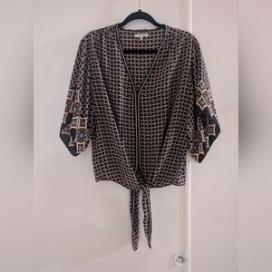 Elegant Black and Cream Patterned Blouse